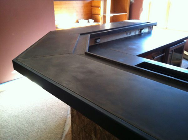 Industrial Concrete Countertop with Steel Edging and Drink Well